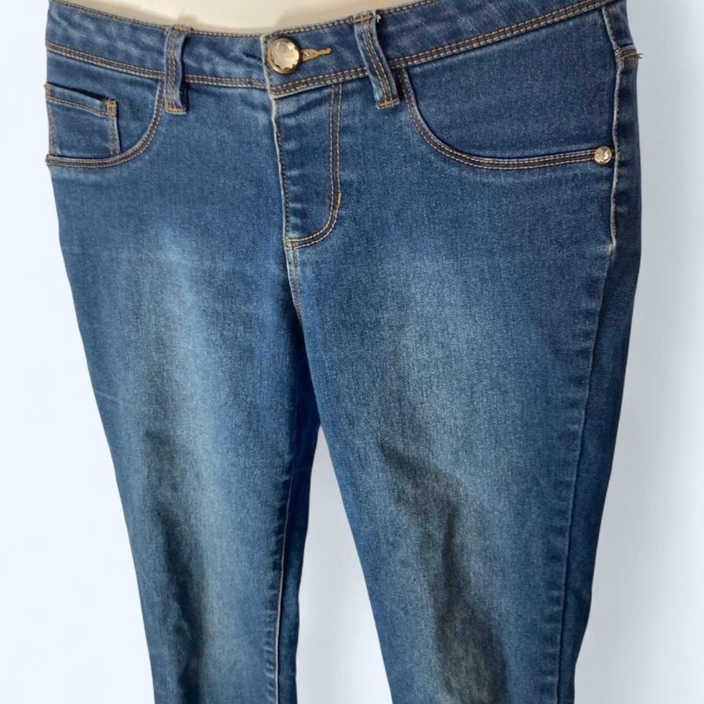 Blue denim jeans Size 14 with detail pockets and bead button squeeze